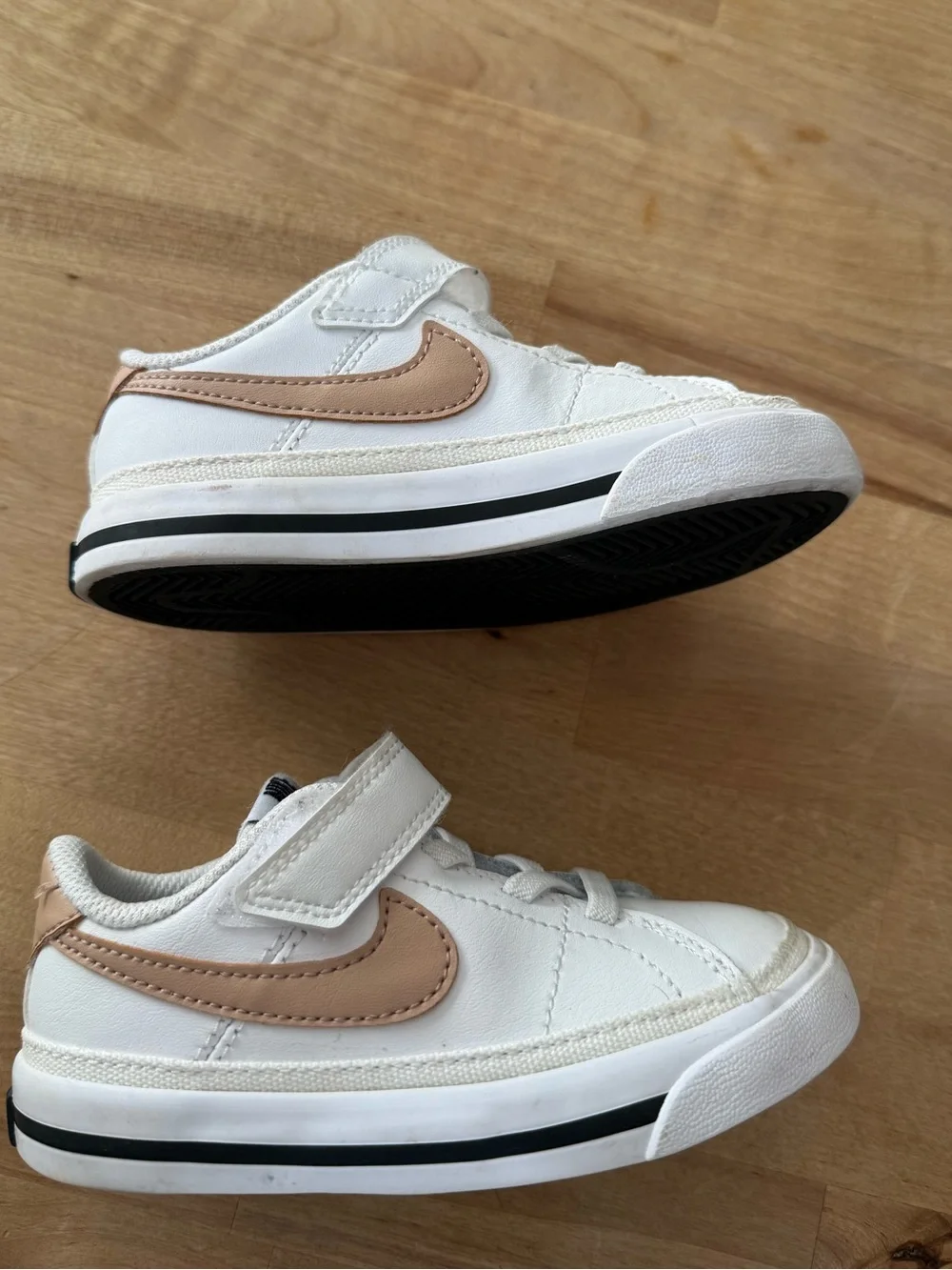 Nike Kids White Sneakers with Metallic Gold Swoosh